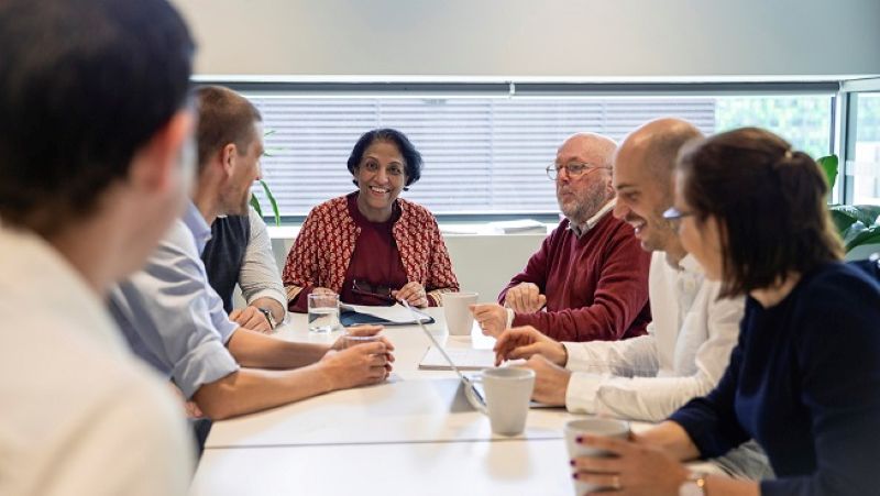 A group of co-workers at a table